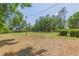 Expansive lot features a mixture of wooded areas and cleared spaces perfect for outdoor activities at 34211 Blanton Rd, Dade City, FL 33523