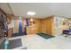 Practical laundry area with washer, dryer, cabinets, and counter space for folding and sorting at 34211 Blanton Rd, Dade City, FL 33523