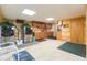 Well-equipped laundry room with washer, dryer, cabinets, sink, and storage space at 34211 Blanton Rd, Dade City, FL 33523