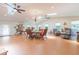 Large living room with plenty of natural light and multiple ceiling fans at 34211 Blanton Rd, Dade City, FL 33523