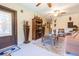 Inviting living room with custom door, unique decor and carpeted flooring at 34211 Blanton Rd, Dade City, FL 33523