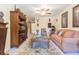 Comfortable living room filled with decor and furniture, lit by a ceiling fan at 34211 Blanton Rd, Dade City, FL 33523