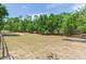 Expansive grassy pasture surrounded by mature trees provides ample grazing and serene privacy at 34211 Blanton Rd, Dade City, FL 33523