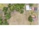 An aerial perspective of the expansive property, highlighting the large lot and accessory buildings at 3515 Bell Farms Dr, Plant City, FL 33566