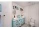 Charming bathroom featuring a double vanity with stylish sinks, elegant mirrors, and modern fixtures at 3515 Bell Farms Dr, Plant City, FL 33566