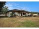 Charming single-story home with a cozy front porch and well-maintained landscaping at 3515 Bell Farms Dr, Plant City, FL 33566