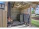 Enclosed storage area with washer, dryer, and a portable restroom at 3515 Bell Farms Dr, Plant City, FL 33566