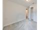 Bright bedroom with carpet floors and closet with sliding doors at 36959 Highland Meadows Ct, Zephyrhills, FL 33542