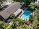 Home with a spacious backyard, pool and mature landscaping at 402 Merlin Ct, Brandon, FL 33510
