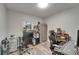 Bright office space with a computer setup, ample storage, and a comfortable gaming chair at 402 Merlin Ct, Brandon, FL 33510