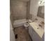 Inviting bathroom features a bathtub, toilet, sink, and vanity, creating a comfortable and functional space at 4420 6Th S Ave, St Petersburg, FL 33711