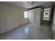 Bedroom with tiled floors, one window, and white walls, a serene and bright space at 4420 6Th S Ave, St Petersburg, FL 33711