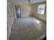Tile floor room featuring light walls, a window and view to another room at 4420 6Th S Ave, St Petersburg, FL 33711