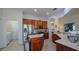 Well-lit kitchen featuring ample counter space, modern appliances, and a functional layout at 443 Noble Faire Dr, Sun City Center, FL 33573
