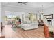 Inviting living space with seamless transition between living, dining, and outdoor areas at 443 Noble Faire Dr, Sun City Center, FL 33573