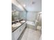 A spacious bathroom features a soaking tub, double vanity, and a shower at 4456 Globe Thistle Dr, Tampa, FL 33619