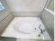 This is a soaking tub with tile surround and chrome fixtures at 4456 Globe Thistle Dr, Tampa, FL 33619