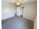 Spacious bedroom with carpet flooring and adjacent closet and bathroom at 4456 Globe Thistle Dr, Tampa, FL 33619