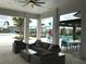 Outdoor lounge area provides comfortable seating, perfect for relaxing by the pool at 4456 Globe Thistle Dr, Tampa, FL 33619