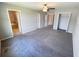 Spacious main bedroom with an ensuite bathroom and walk-in closet at 4456 Globe Thistle Dr, Tampa, FL 33619