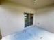 Outdoor patio with view into the kitchen through sliding glass door at 4456 Globe Thistle Dr, Tampa, FL 33619