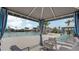 Relaxing pool area with shaded cabana, lounge chairs, and clear blue water at 4456 Globe Thistle Dr, Tampa, FL 33619
