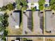Aerial shot of the property and neighborhood showing roof lines, yards, and surrounding trees at 4516 Savannah Holly Pl, Riverview, FL 33578