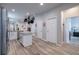 Open kitchen featuring granite countertops, center island, and open access to other rooms at 4516 Savannah Holly Pl, Riverview, FL 33578