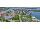 Waterfront community with a mix of condos, single Gathering homes, canals, boat docks, and lush tropical landscape at 4935 58Th S Ave, St Petersburg, FL 33715