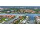 Picturesque aerial view of waterfront home with a private boat dock, enhancing coastal living at 4935 58Th S Ave, St Petersburg, FL 33715
