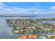 Spacious waterfront property with pool and dock amid a beautiful neighborhood setting with water views at 4935 58Th S Ave, St Petersburg, FL 33715