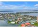 Scenic waterfront home featuring a private pool and dock in a lovely, upscale community at 4935 58Th S Ave, St Petersburg, FL 33715