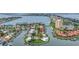 Waterfront property with mature tropical landscaping, private boat dock, and quick access to bay in Florida community at 4935 58Th S Ave, St Petersburg, FL 33715