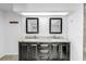 Contemporary bathroom with dual sinks, granite countertop, and sleek vanity at 4935 58Th S Ave, St Petersburg, FL 33715