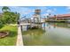 Boat dock with boat lift on a waterfront property, perfect for boating enthusiasts at 4935 58Th S Ave, St Petersburg, FL 33715