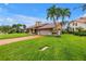 Well-manicured home with tile roof and landscaped front yard at 4935 58Th S Ave, St Petersburg, FL 33715