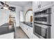 Spacious kitchen boasting granite countertops, stainless appliances, and ample cabinetry at 4935 58Th S Ave, St Petersburg, FL 33715