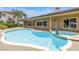Inviting pool with mermaid fountain and refreshing water, perfect for relaxing and entertaining outdoors at 4935 58Th S Ave, St Petersburg, FL 33715