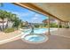 Inviting backyard pool and spa with a view of the waterfront at 4935 58Th S Ave, St Petersburg, FL 33715
