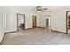 View of the bedroom showing the layout and connections to the bathroom and walk-in closet at 5306 Downing St, Dover, FL 33527