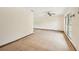 Spacious room featuring tile flooring, neutral walls, and an expansive window for natural light at 5306 Downing St, Dover, FL 33527