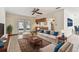 Comfortable living space with tiled floor, access to the kitchen and backyard patio at 5306 Downing St, Dover, FL 33527