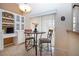 Bright breakfast nook with a cozy table and chairs and a desk at 542 Princeton Greens Ct # 21, Sun City Center, FL 33573