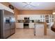 Bright kitchen with stainless steel appliances and ample counter space at 542 Princeton Greens Ct # 21, Sun City Center, FL 33573