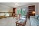 Inviting living area with balcony access, and comfortable seating arrangements at 542 Princeton Greens Ct # 21, Sun City Center, FL 33573