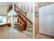 A multi-story staircase with carpeted steps and wooden banisters at 542 Princeton Greens Ct # 21, Sun City Center, FL 33573
