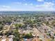 Panoramic aerial shot of residential neighborhood, showcasing tree coverage and street layout at 5628 Mccoy Ct, Zephyrhills, FL 33542