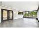 Spacious screened-in lanai offering a relaxing outdoor living space at 5628 Mccoy Ct, Zephyrhills, FL 33542