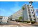 Condominium exterior showing parking lot and multiple balconies at 5925 Shore S Blvd # 611, Gulfport, FL 33707