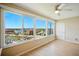 Bright living room with a ceiling fan and water view at 5925 Shore S Blvd # 611, Gulfport, FL 33707